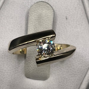 14kt modern designer bypass three-quarter carat diamond ring