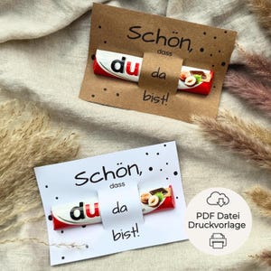 PDF-Druckvorlage mit Duplo-Banderolen ‚Schön, dass du da bist‘ – zum Ausdrucken, Basteln und Verschenken als Gastgeschenk für Hochzeit, Taufe oder Geburtstag.