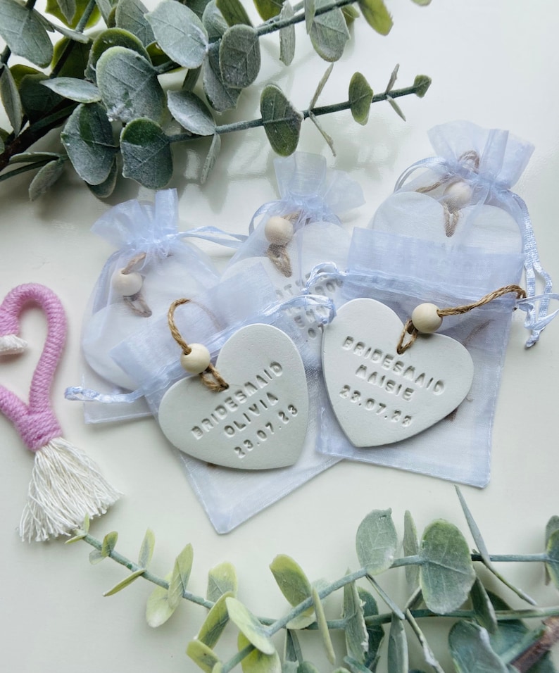 Personalised clay heart wedding place name favour tag image 1