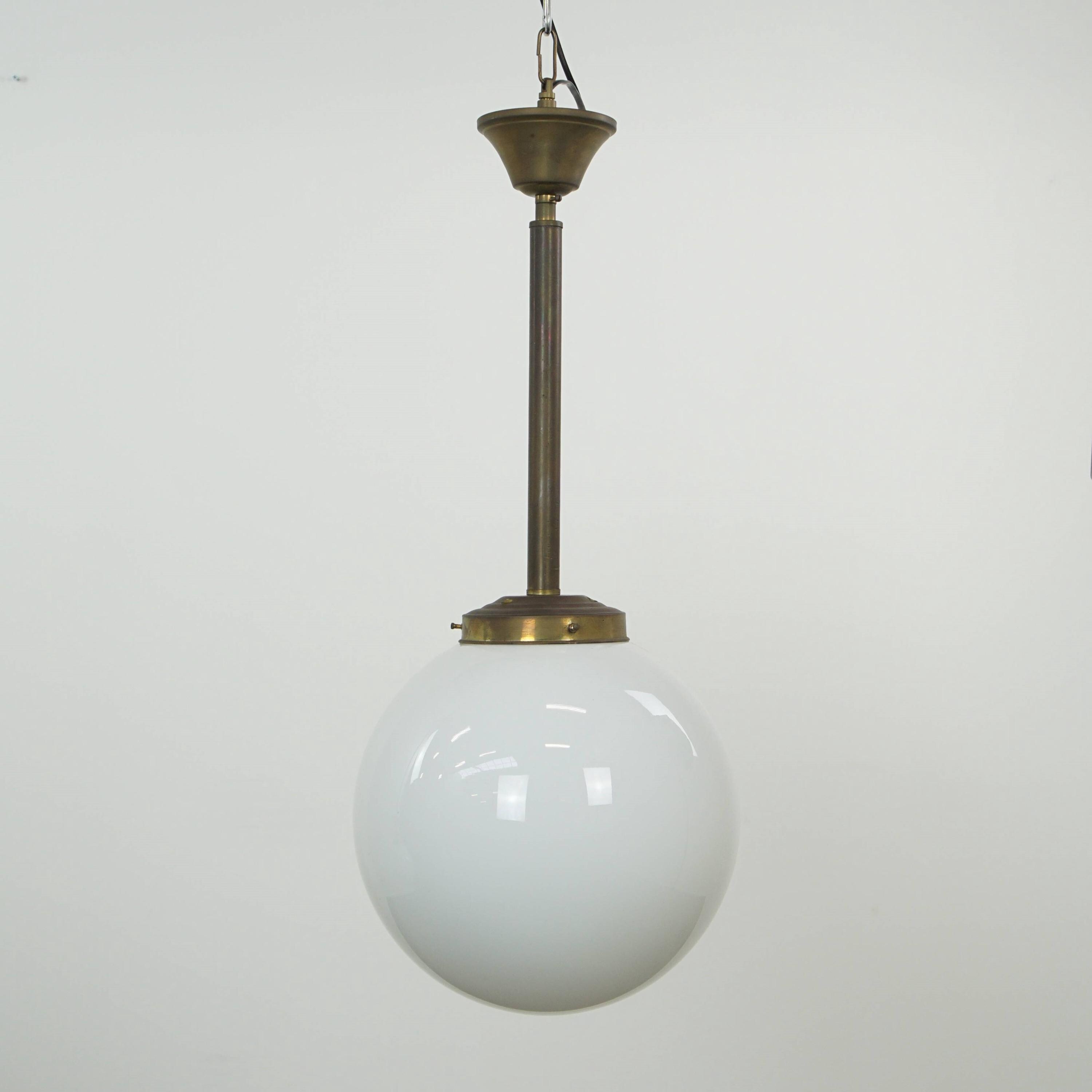 Charming vintage glass globe pendant/ceiling lamp made of milk glass in Art Deco style
