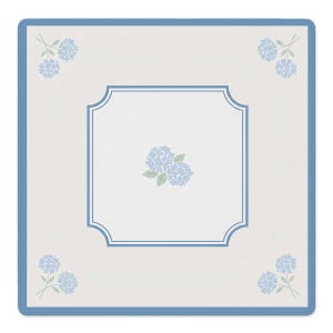 May include: A square off-white cloth featuring a blue border and a central blue frame. The design includes light blue hydrangea flower clusters with green leaves positioned in each of the four corners and a single cluster in the center.