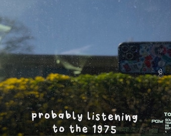 Probably listening to the 1975 decal