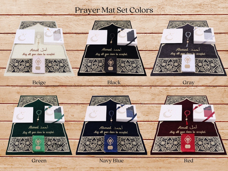May include: A set of prayer mats in six different colors: beige, black, gray, green, navy blue, and red. Each mat features a traditional Islamic design with gold accents and includes a matching prayer rug, prayer beads, and a small box. The text on the mats reads "Ahmed" and "Amal" in Arabic, with the English translation "May all your deeds be accepted."