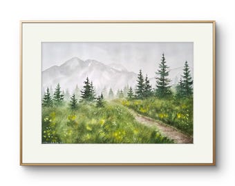 May include: Watercolor painting of a mountain landscape with a path winding through a field of green grass and yellow flowers. Evergreen trees dot the scene, and a mountain range is visible in the background. The artwork is framed in a gold-colored frame.