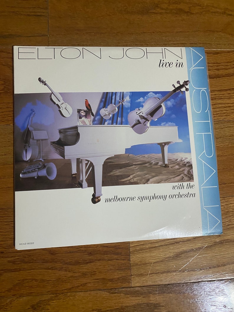 elton john album cover black with date only elton john album cover black with date only