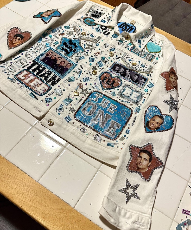Embellished Backstreet Boys jacket with star patches, photo patches, and blue and silver rhinestones.