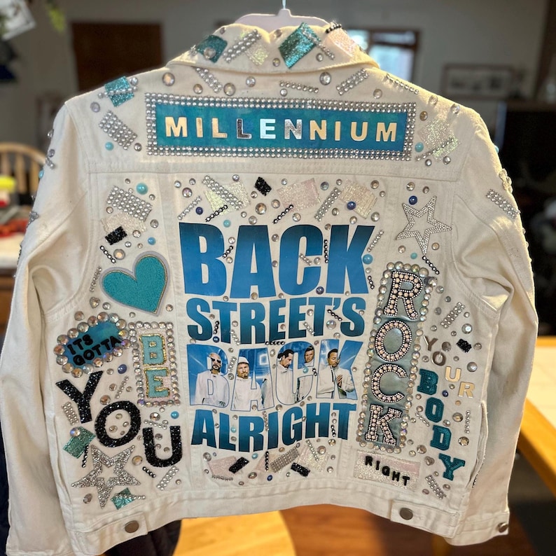 Cream custom denim jacket back with Millennium and Backstreet's Back Alright design.