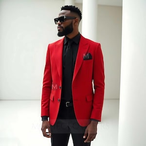 May include: A vibrant red blazer with a black shirt and tie. The blazer has a two-button closure and a pocket square. The outfit is completed with black pants and sunglasses. The image features the text "MECIOTHERS".