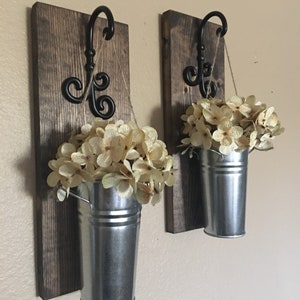 Large hanging galvanized pails with flowers or greenery, rustic home decor, rustic wood decor, hanging flower baskets, home decor
