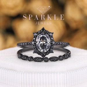 ゴシックブラックゴールドオーバルグレーモアッサナイトエンゲージリングセット、ブラックロジウムブライダルセットダークウィッチプロミスウェディングリングジュエリーギフト（女性用）