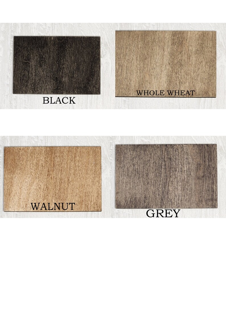 May include: Four rectangular wooden samples in black, whole wheat, walnut, and grey. Each sample has a wood grain texture and a label with the color name in white text.
