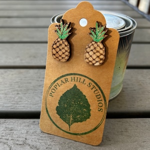 Ananasoorbellen van esdoornhout: handgemaakte tropische sieraden