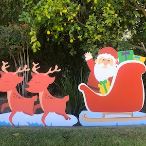 Santa&#39;s Sleigh and Flying Reindeer Yard and Lawn Decorations. Includes Rudolph the red nosed reindeer just in time for Christmas!