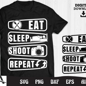 May include: Black and white graphic design with the text "Eat, Sleep, Shoot, Repeat" with a camera, a bed, and a fork and knife icon.