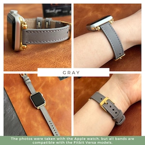 Pode incluir: Pulseira de rel&oacute;gio de couro cinza com ferragens douradas. A pulseira &eacute; mostrada em um pulso e em uma mesa.