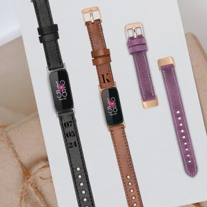 Könnte beinhalten: Drei verschiedene Uhrenarmbänder in schwarzem, braunem und violettem Leder. Die Armbänder sind alle aus weichem, geschmeidigem Leder gefertigt und haben einen klassischen Look. Die Armbänder sind mit einer Vielzahl von Smartwatches kompatibel.