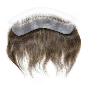 May include: A brown hairpiece with a lace front and a thin, clear, semi-circular base.
