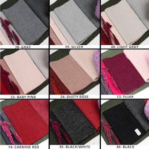May include: Swatch cards showing different fabric colors and textures. The colors include gray, silver, light gray, baby pink, dusty rose, plum, carmine red, black/white, and black.