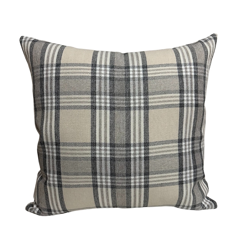 May include: A beige and gray plaid throw pillow with a square shape.
