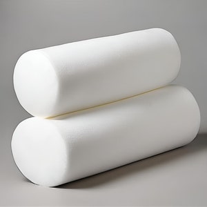 May include: Two white foam rollers stacked on top of each other. The rollers are cylindrical and have a smooth, slightly textured surface.