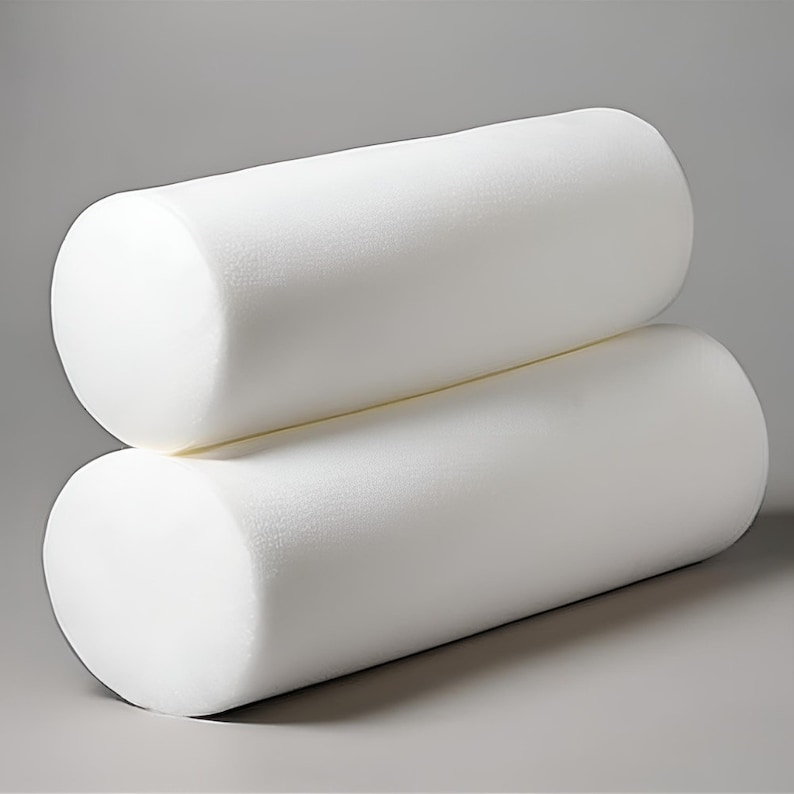 May include: Two white foam rollers stacked on top of each other. The rollers are cylindrical and have a smooth, slightly textured surface.