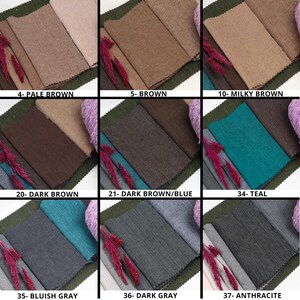May include: A fabric swatch card with nine different fabric samples. The samples are arranged in three rows of three. The colors of the fabric samples are: pale brown, brown, milky brown, dark brown, dark brown/blue, teal, bluish gray, dark gray, and anthracite.