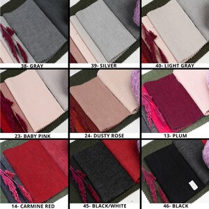 May include: Swatch cards showing different fabric colors and textures. The colors include gray, silver, light gray, baby pink, dusty rose, plum, carmine red, black/white, and black.