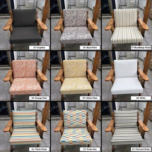 May include: A collection of nine wooden armchairs featuring various seat and back cushions in different patterns and colours, labelled 55-Graphite, 56-Black Palm, 57-BlackBeige Stripe, 58-Orange Palm, 59-Yellow Palm, 60-White, 61-Fiesta Stripe, 62-Fiesta Geo, 63-Charcoal Stripe.