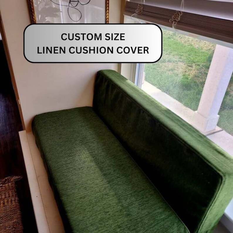 May include: A green linen cushion cover for a window seat. The text "CUSTOM SIZE LINEN CUSHION COVER" is displayed on a white background.