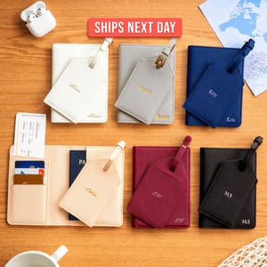 May include: An assortment of personalized passport holders and luggage tags in various colors, including white, gray, navy blue, burgundy, and black. Each item has a name or initials printed on it. The image also includes a travel wallet and a map.