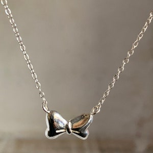 Magical Silver Bow Necklace , Cute and Delicate