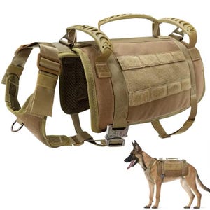 May include: A tan tactical dog harness with multiple adjustable straps and a handle on top. The harness has a mesh panel for ventilation and multiple pockets for storage. A German Shepherd dog is wearing a similar harness.