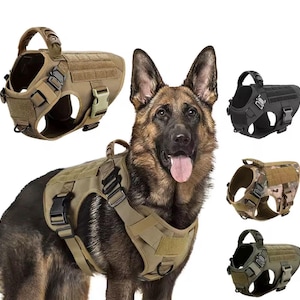 May include: A German Shepherd dog wearing a tan tactical dog harness with multiple attachment points and a handle. Additional harnesses in black, camouflage, and olive green are also displayed. The harnesses have adjustable straps and secure buckles.