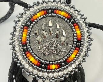 Handmade indigenous style silver bears paw beaded bolo