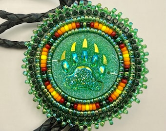 Handmade indigenous style green bears paw beaded bolo
