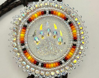 Handmade indigenous style white bears paw beaded bolo