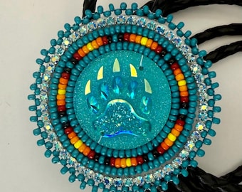 Handmade indigenous style turquoise bears paw beaded bolo