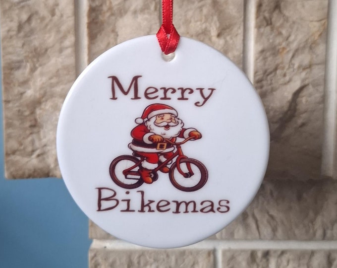 Santa Cycling Christmas tree decoration with lovely Cyclist Christmas design