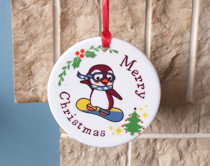 Snowboarding Christmas tree decoration with lovely Snowboarder Penguin Christmas design