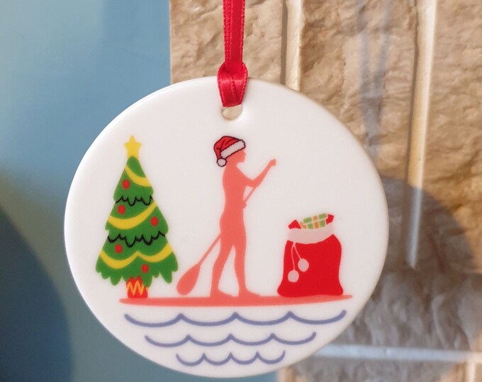 Paddleboarding Christmas tree decoration with lovely Female Paddleboarder Christmas design