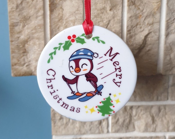 Skiing Christmas tree decoration with lovely skiing Penguin Christmas design