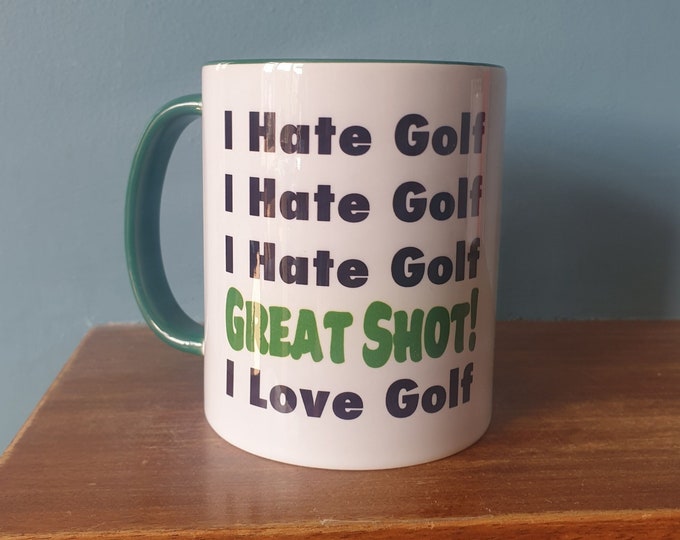 A lovely golf themed mug with green handle and green inside