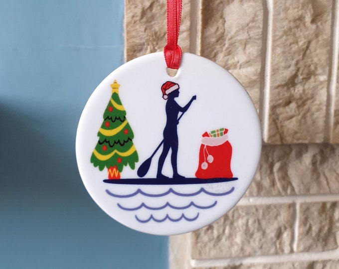 Paddleboarding Christmas tree decoration with lovely Female Paddleboarder Christmas design