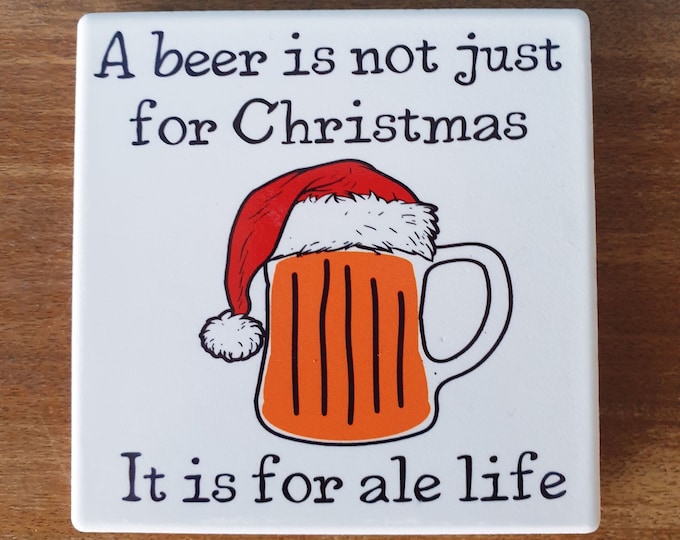 Beer themed ceramic drinks coaster with funny beer themed design 'A beer is not just for Christmas. It is for ale year'