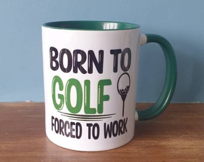 A lovely golf themed mug with green handle and green inside