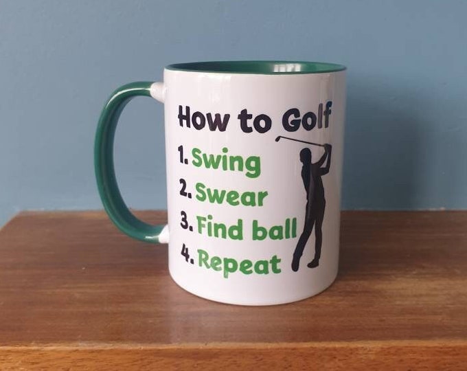 A lovely golf themed mug with green handle and green inside