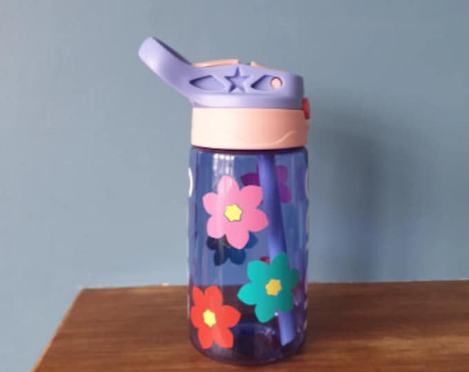 Kids water bottle 480ml leak proof pop up spout water bottle with handle personalised with a vinyl name and Flower design. BPA free.