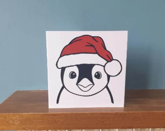 Penguin with Santa's hat Christmas card / greetings card