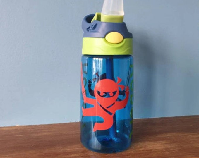 Kids water bottle 480ml leak proof pop up spout water bottle with handle personalised with a name and Ninja design in vinyl. BPA free.