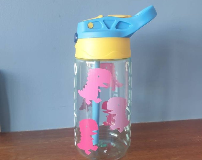 T-rex Kids 480ml pop up spout water bottle with handle personalised with a vinyl name and colourful T-rex design.BPA free.